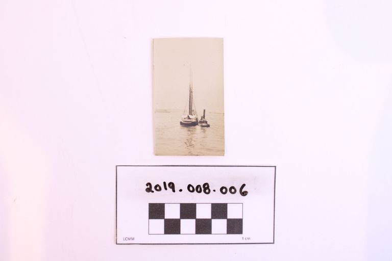 Sailboat Accompanied by a Smaller Boat