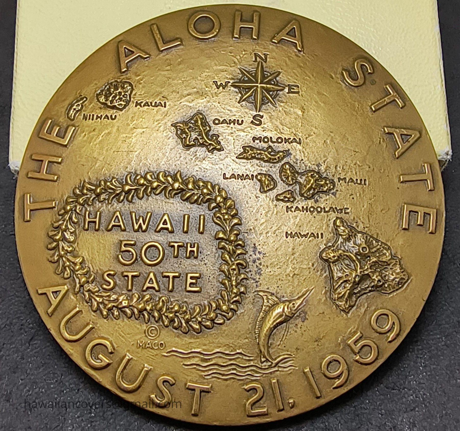 Author's Personal Collection - Obverse side: Senate Concurrent Resolution No. 12 of the first Hawaii Legislature authorized the issuance of a bronze medallion commemorating the admission of Hawaii into the Union. The resolution specified that the obverse side of the medallion should carry the map of Hawaii with the words "Hawaii, The Aloha State," and August 21, 1959, the date of admission by proclamation issued by President Eisenhower.
Above credit per leaflet attached in this entry.