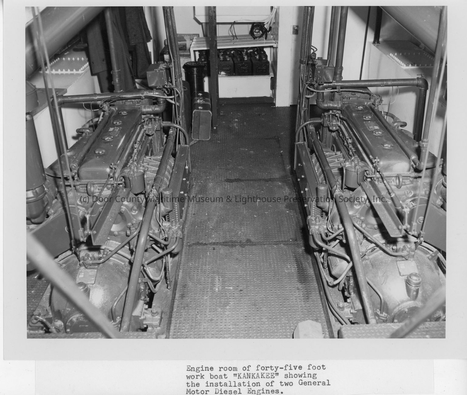 Kankakee engine room with view of two General Motor diesel engines
