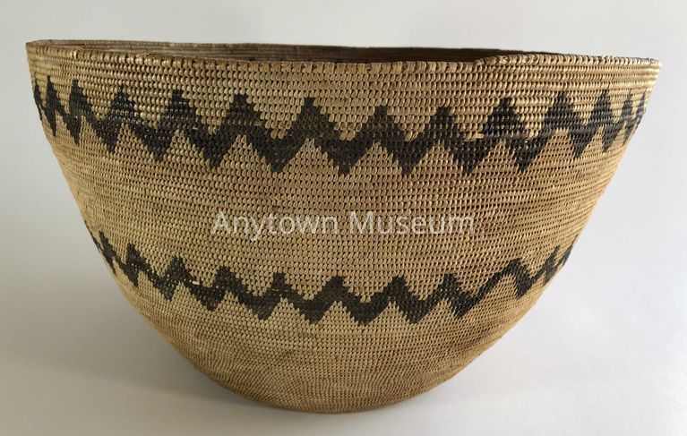 Note the end of the top coil, left direction.  Finished with self-coiling on the rim.