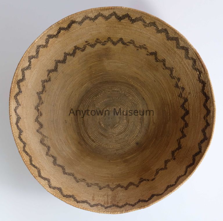 Note the wear patterns and stains from the basket having been cooked in