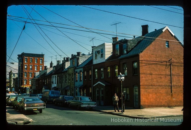 Color slide of eye-level view of row houses on Willow Terrace (7th) looking E from the NW corner with Clinton picture number 1