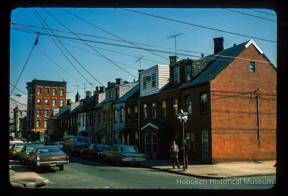 Color slide of eye-level view of row houses on Willow Terrace (7th) looking E from the NW corner with Clinton picture number 1