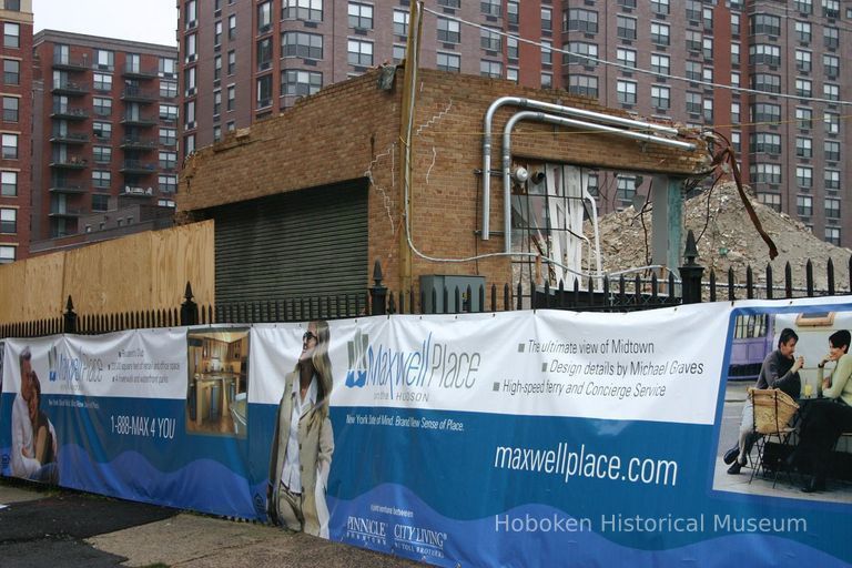 Digital color image of the Maxwell House Coffee plant site with printed vinyl fence sign banners, Hoboken, October 2004. picture number 1