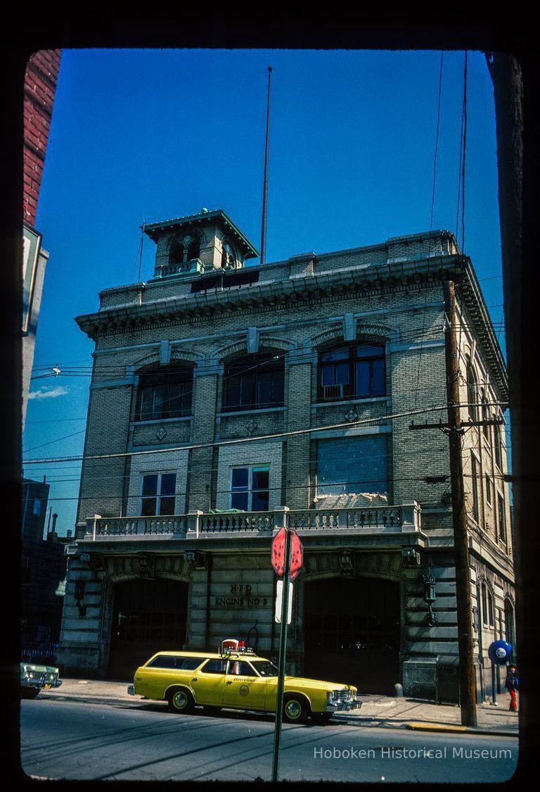 Color slide of eye-level view of the Hoboken Fire Department Engine Company No. 3 fire station façade at 201 Jefferson on the corner with 2nd picture number 1