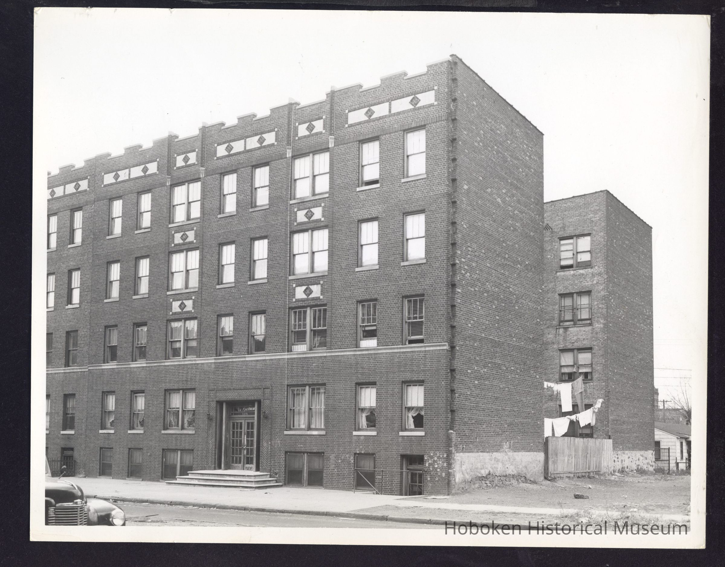 B&W photo of apartment building at 125 Corbin Avenue, Jersey City. picture number 1
