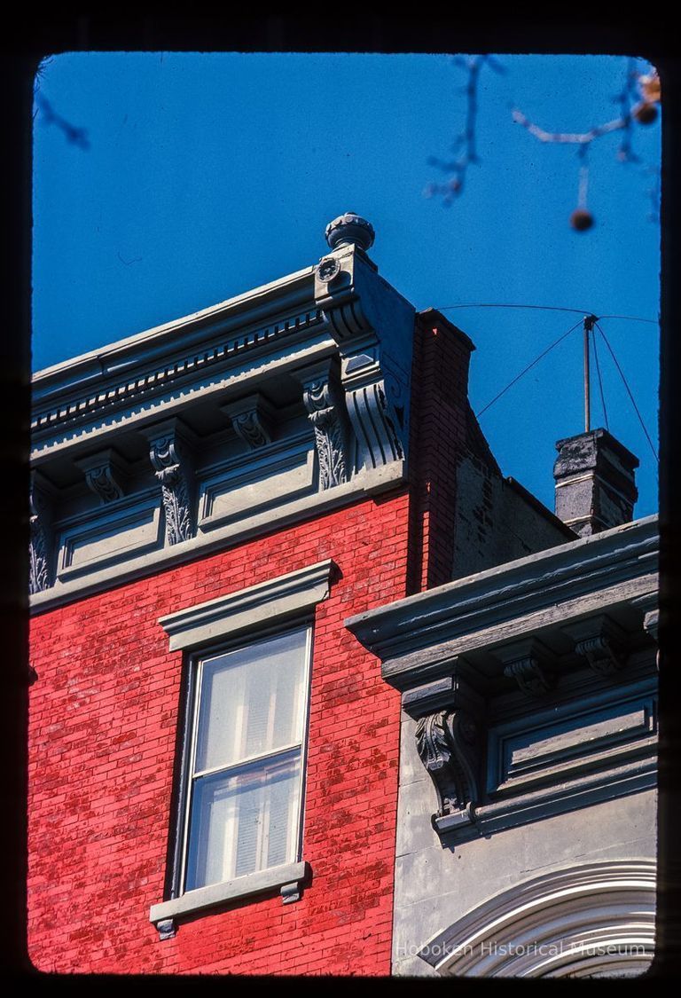 Color slide of detail view of cornices and brackets at 502 and 504 Hudson between 5th and 6th picture number 1