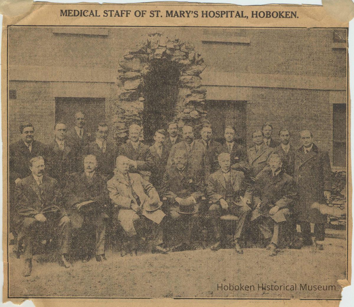 Newspaper clipping from album with photo of Medical Staff of St. Mary's Hospital Hoboken from unidentified newspaper, no date, ca. 1915-25. picture number 1
