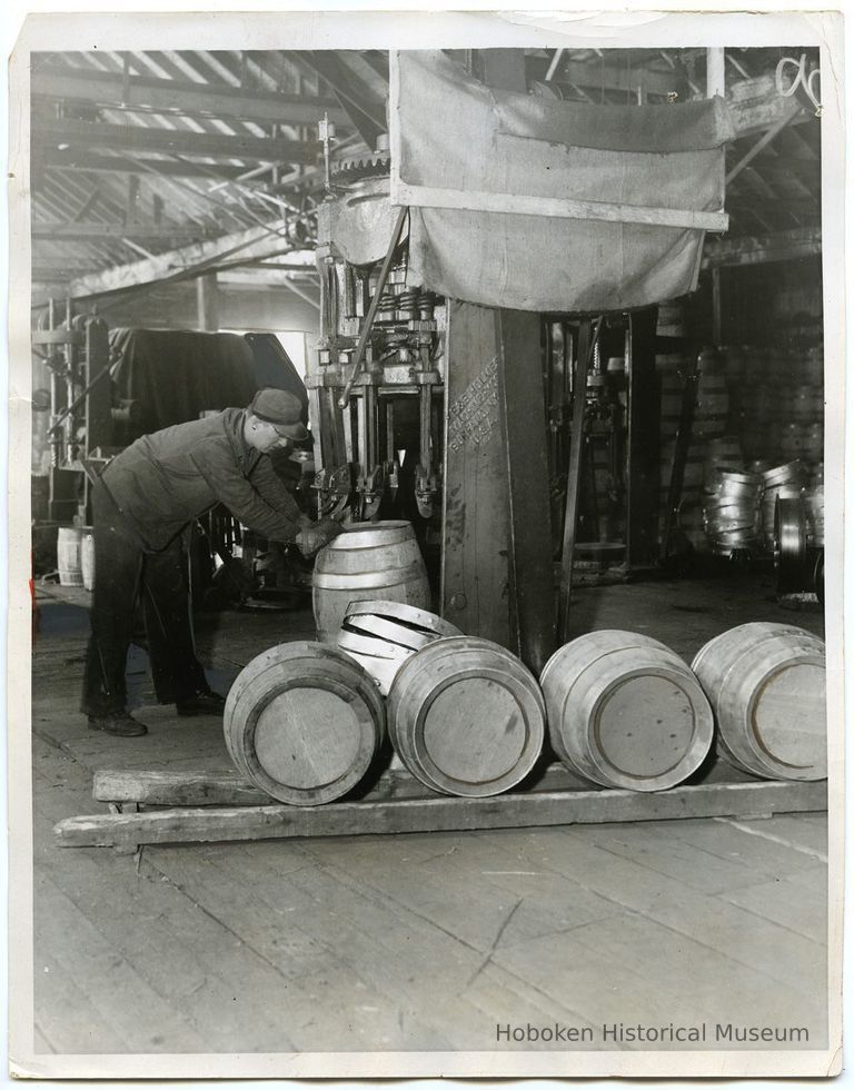 image: cooper at work on barrels, Verdi Bros. Cooperage