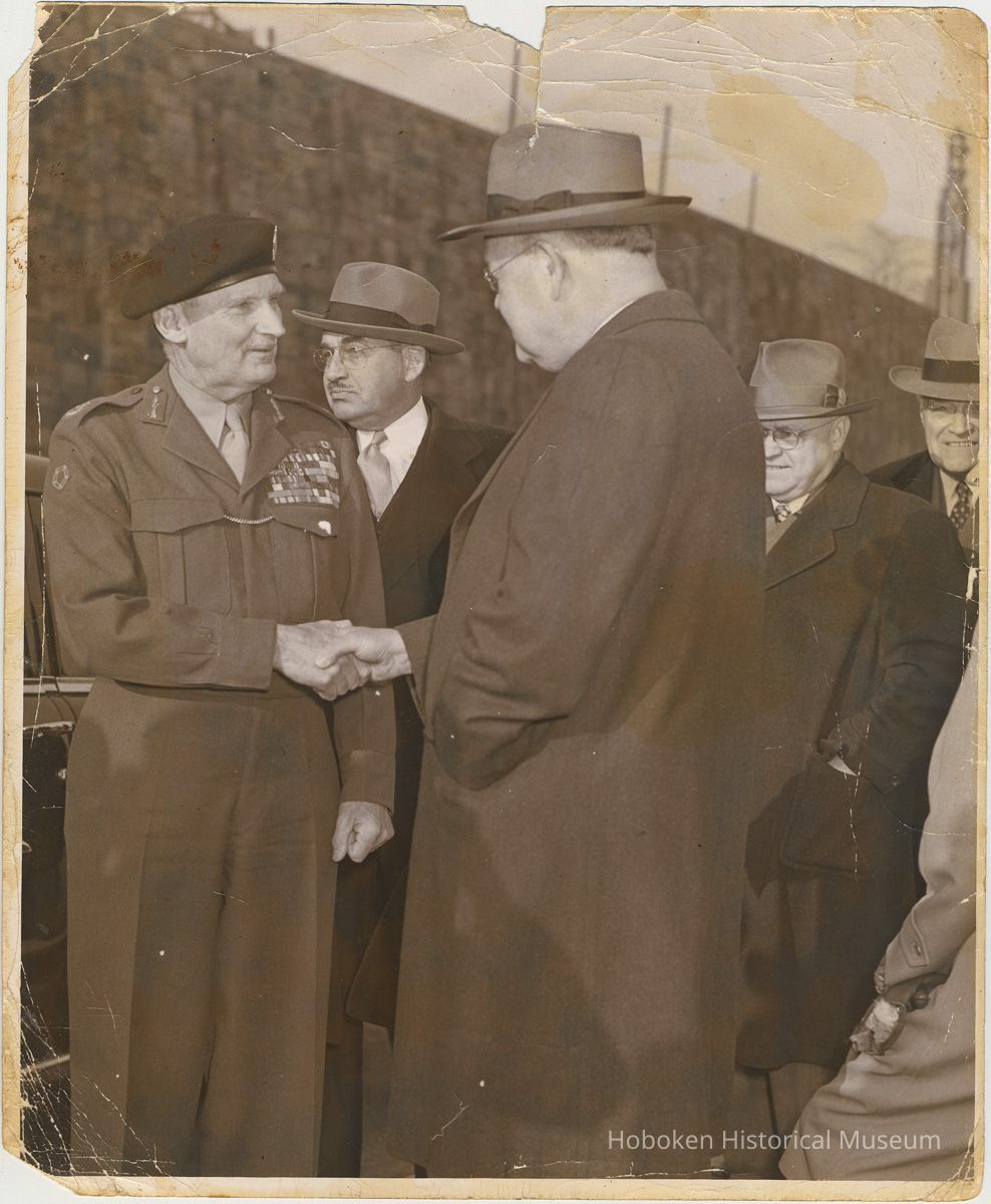 Sepia-tone photo of Field Marshall Bernard Montgomery with dignitaries at Lincoln Tunnel, Weehawken, circa 1950-1953. picture number 1