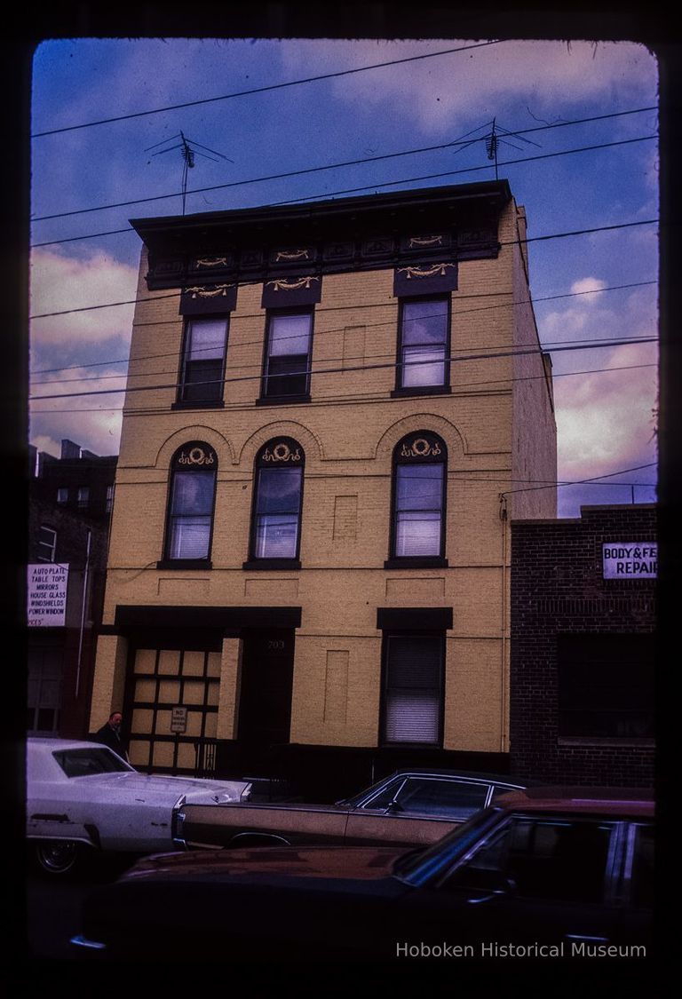 Color slide of eye-level view of façade at 703 Grand between 7th & 8th (now demolished) picture number 1