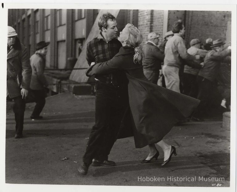 B+W publicity photo of Marlon Brando as Terry Malloy with Eva Marie Saint as Edie Doyle in film 