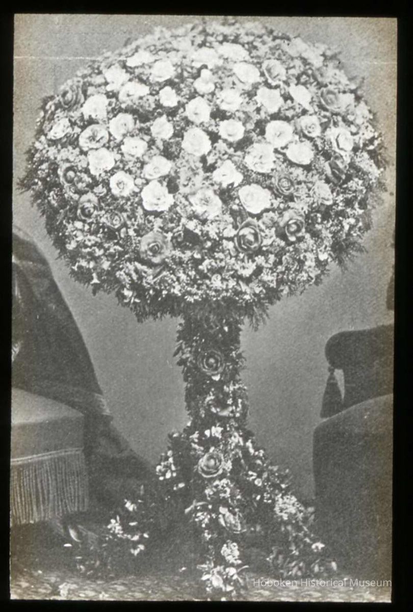 Lantern slide, b+w, of a floor floral decoration, used for promotional display in Hoboken, no date, ca. 1920. picture number 1
