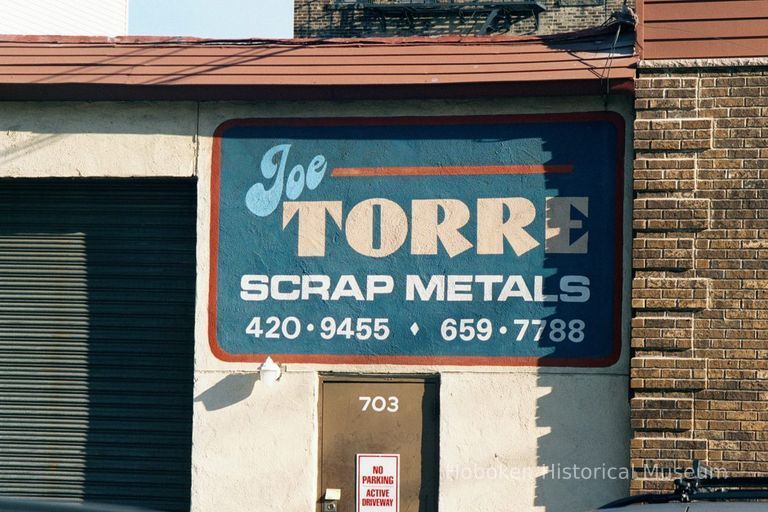 Color photo of painted sign on wall for Joe Torre Scrap Metals, 703 Adams Street, Hoboken, Jan. 3 & 4, 2002. picture number 1