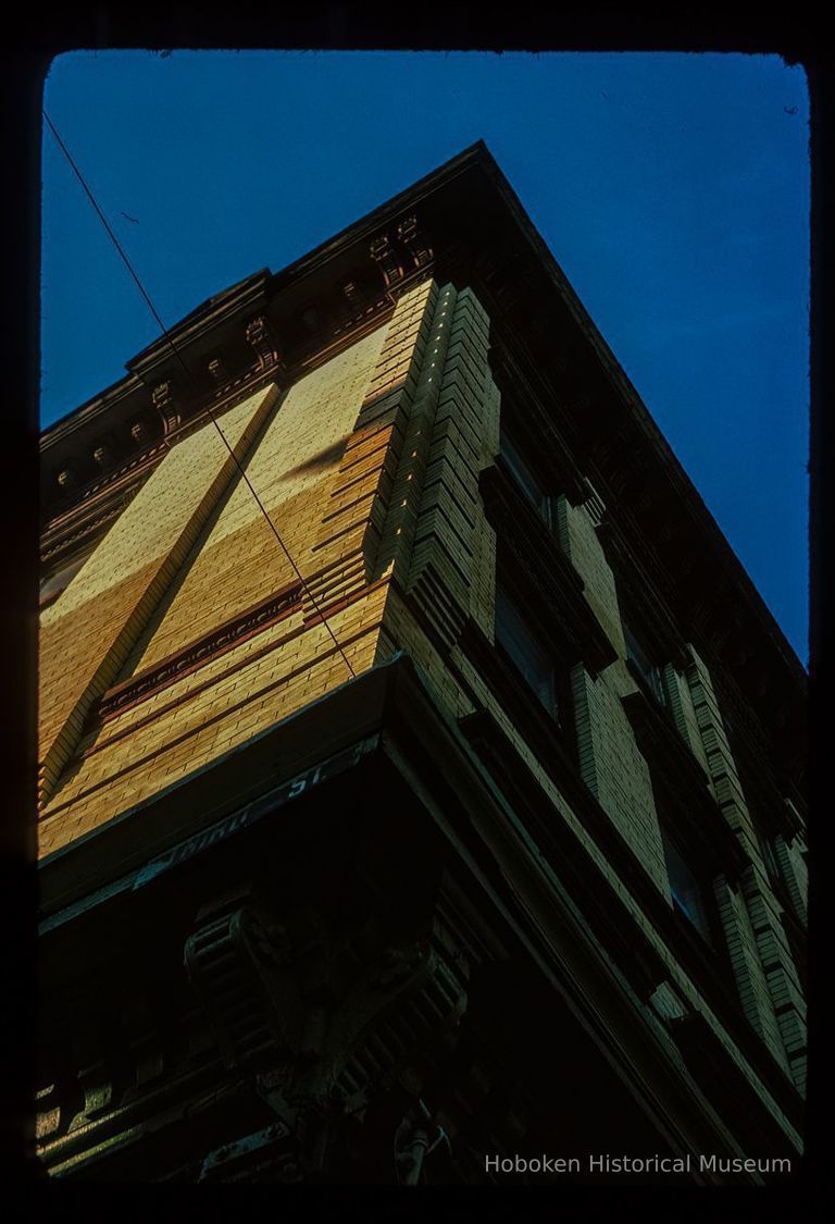 Color slide of detail view of cornice, brick pilasters, quoins, and pediment at 300 Garden picture number 1