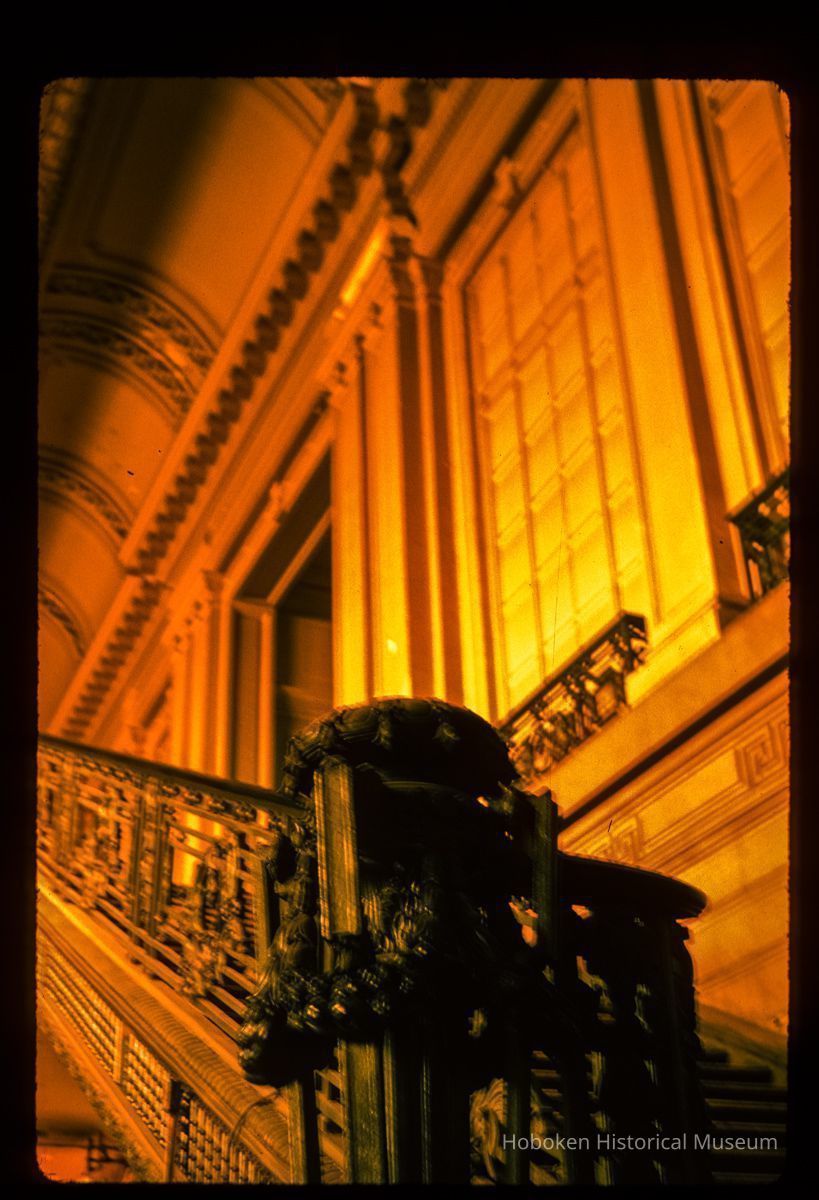 Color slide of interior detail view of the Lackawanna Terminal waiting room staircase, railing and wall picture number 1