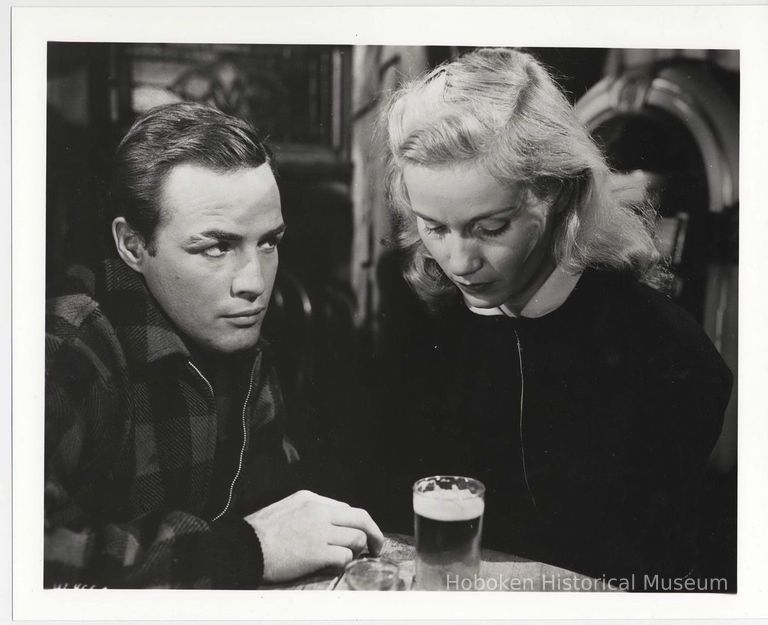 B+W publicity photo of Marlon Brando as Terry Malloy, Eva Marie Saint as Edie Doyle in film 