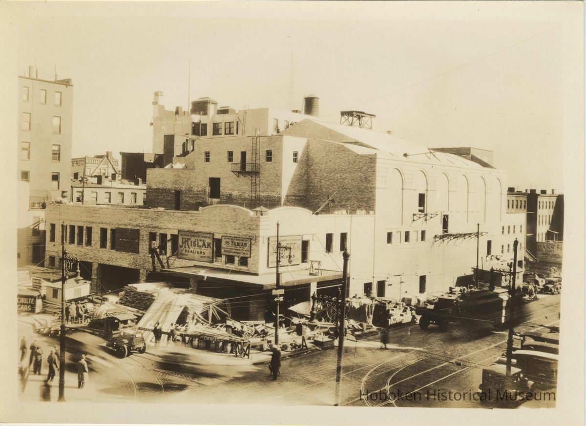 Sepia-tone photo of the exterior of the Fabian Theatre, Newark & Washington Sts., Hoboken, no date, ca. April 15-25, 1928. picture number 1