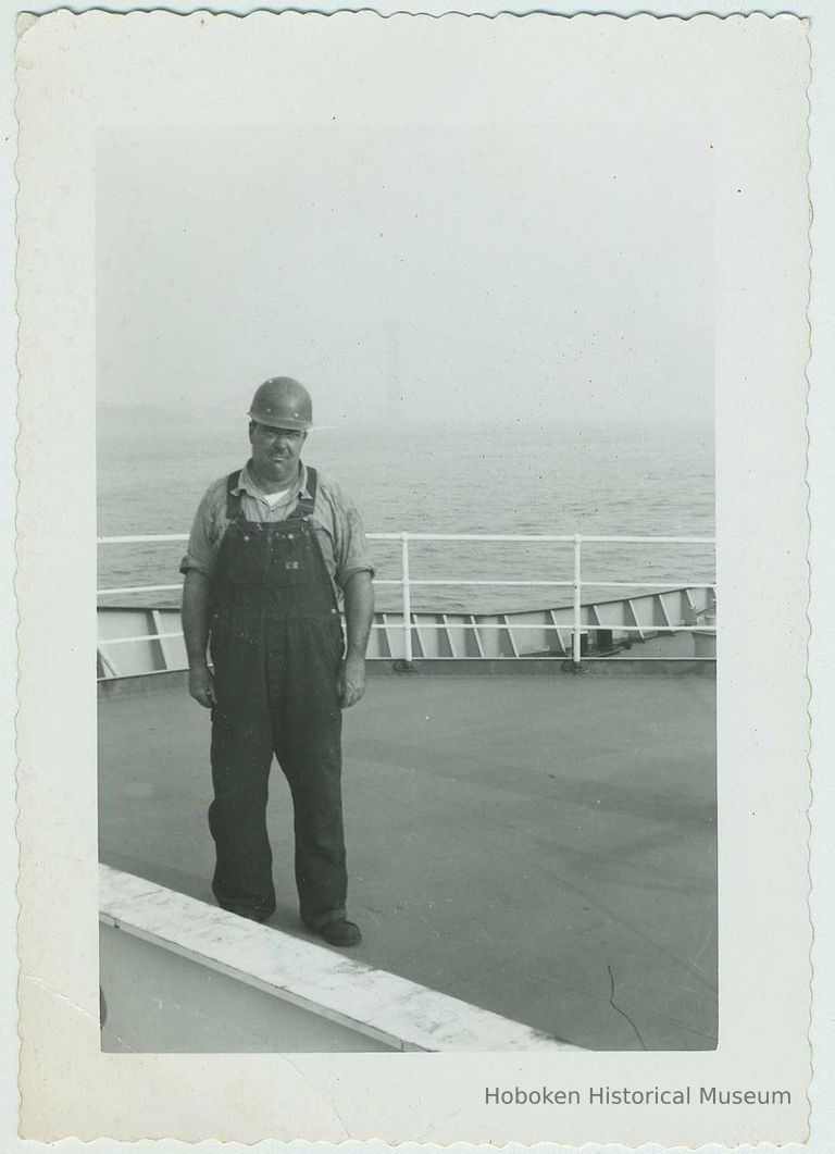 B+W photo of Charlie Kosbab on an upper deck of an unidentified vessel, no date, ca. 1965-70. picture number 1