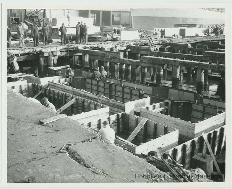 B+W photo of the construction of Pier 5 (formerly Pier 14) at the Bethlehem Steel Shipyard, Hoboken Division, Nov. 27, 1957. picture number 1