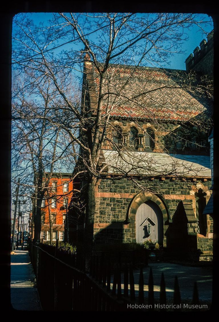 Color slide of eye-level view of the rear entrance of the Church of the Holy Innocents at 534 Willow taken from 6th between Clinton and Willow looking E picture number 1