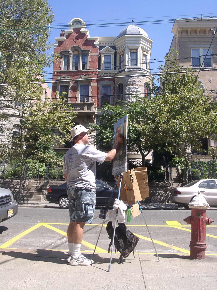 Digital photos, 29, of artist Frank Hanavan working on a painting of 921 Hudson Street, Hoboken, August 25, 2005. picture number 1