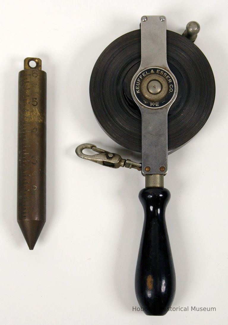 side with manufacturer's plate; with measuring plumb bob