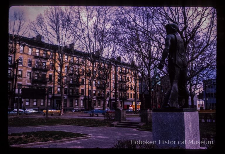 Color slide of eye-level view from Columbus Park looking SW at row houses on Clinton between 9th and 10th picture number 1