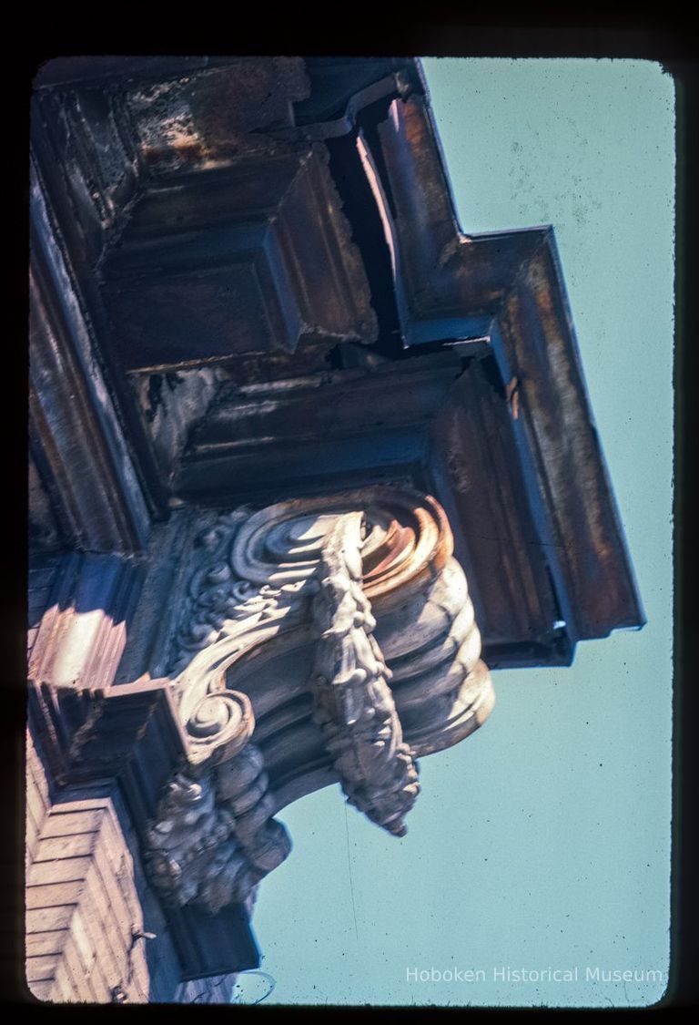 Color slide of detail view of cornice, dentil and bracket on an unidentified building on Washington between 2nd and 3rd picture number 1