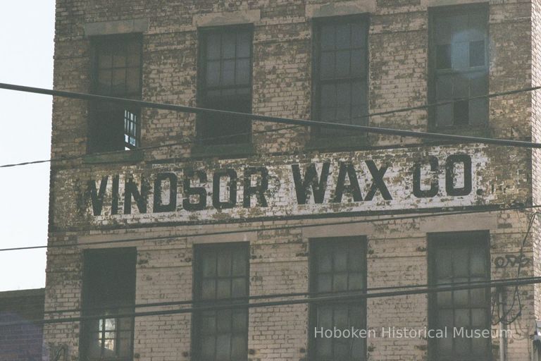 Color photo of painted sign on building for Windson Wax Company, Observer Highway at Jackson Street, Hoboken, Jan. 3 & 4, 2002. picture number 1