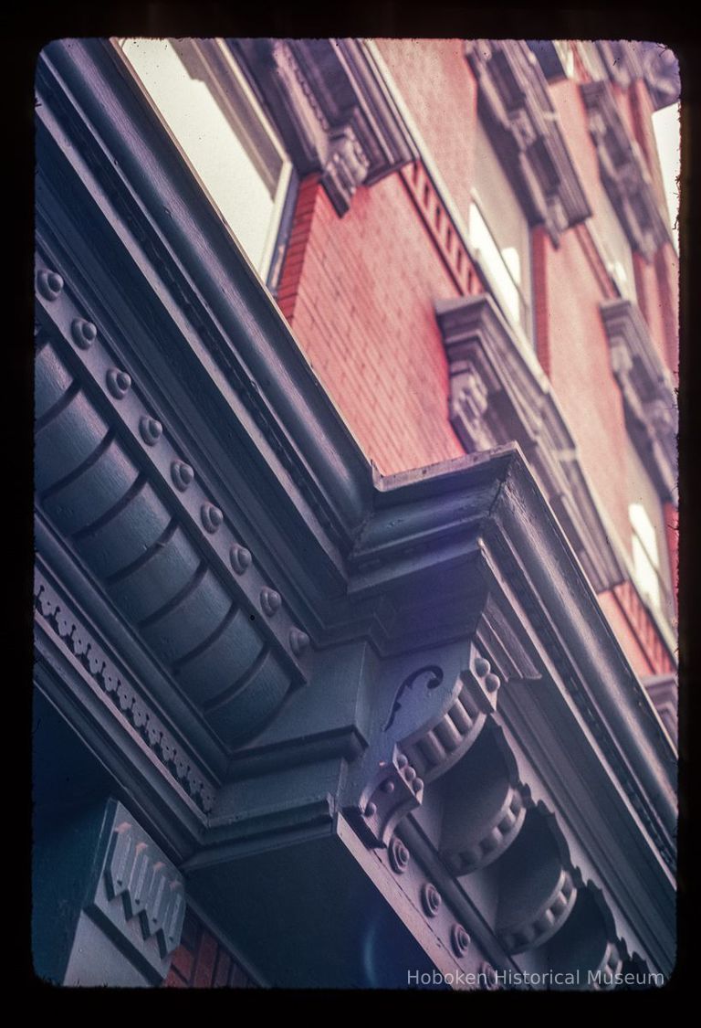 Color slide of detail view of cornice, bracket and pediments at 219 11th on the SE corner of 11th and Park picture number 1