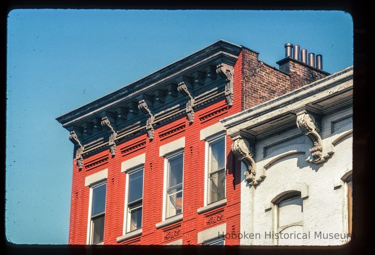 Color slide of detail view of cornice, brackets, frieze and brickwork at an unidentified location picture number 1