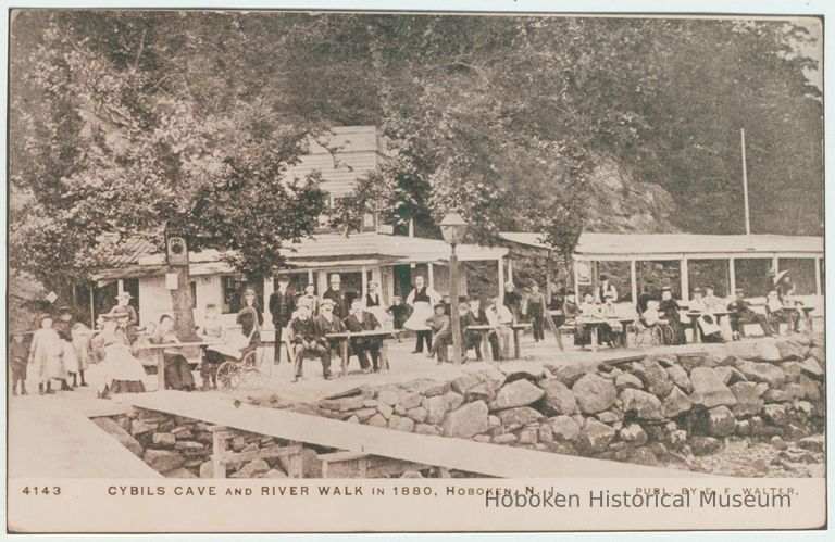 Color copy photo of a sepia-tone photo postcard of Cybil's (sic) Cave and River Walk, Hoboken, ca. 1880 by E. F. Walter. picture number 1