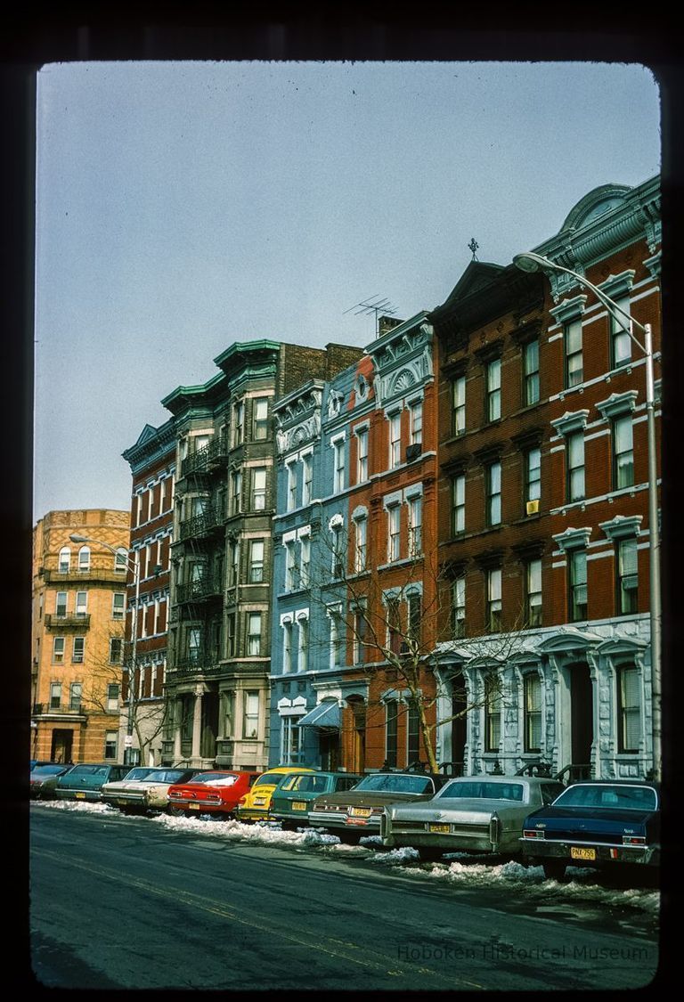 Color slide of eye-level view of row houses looking N at the E side of Washington between 11th and 12th picture number 1