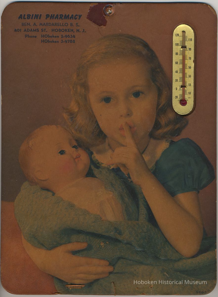 Wall calendar with thermometer from Albini Pharmacy, 401 Adams St., Hoboken, no date, probably 1954. picture number 1
