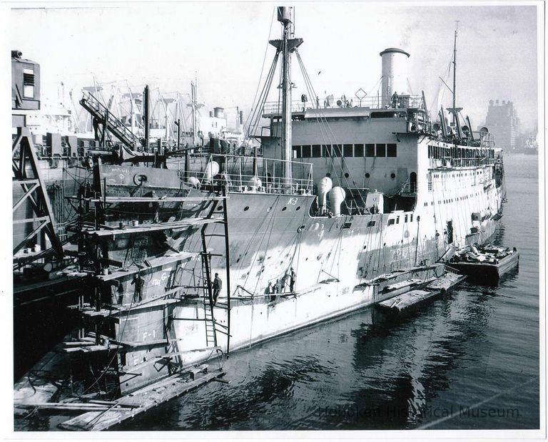 B+W photo of the painting of berthed unknown freighter, Hoboken, no date, ca. 1940. picture number 1