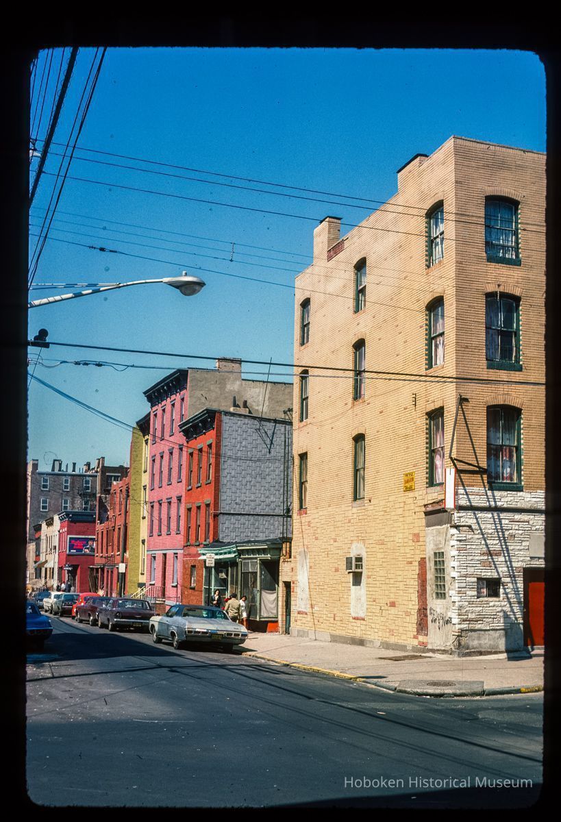 Color slide of eye-level view of row houses on the N side of 2nd between Garden and Park looking W picture number 1