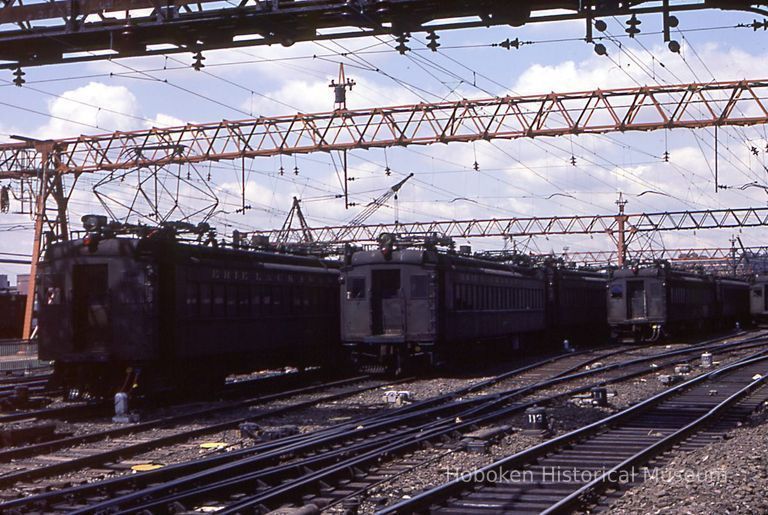 1: view southwest from east side of yard; old E-L MU passenger cars