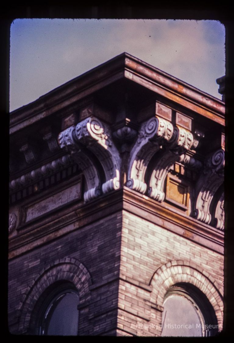 Color slide of detail view of cornice, brackets, frieze and brick semicircular arches at 163 Fourteenth Street on the SE corner with Garden picture number 1