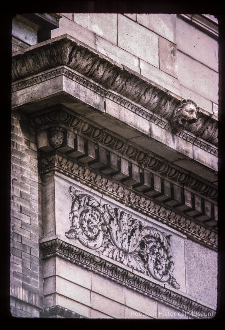 Color slide of detail view of cornice, dentils and frieze of the Jefferson Trust Company building at 313 1st on the SE corner of 1st and Clinton picture number 1