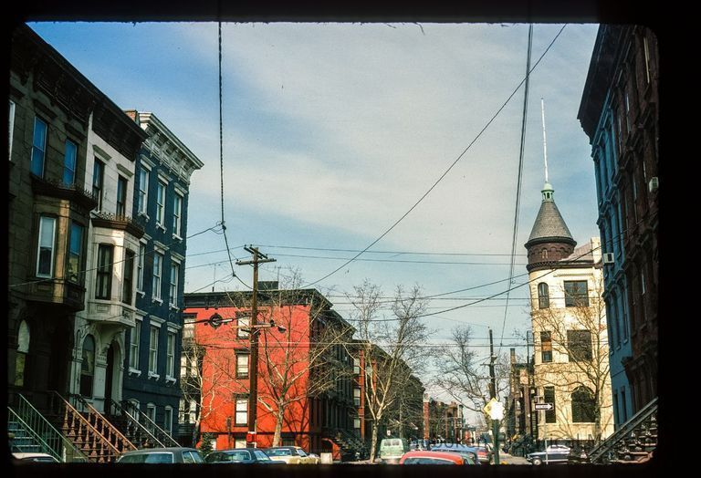 Color slide of eye-level view of row houses on Bloomfield looking N from the SE corner with 11th picture number 1