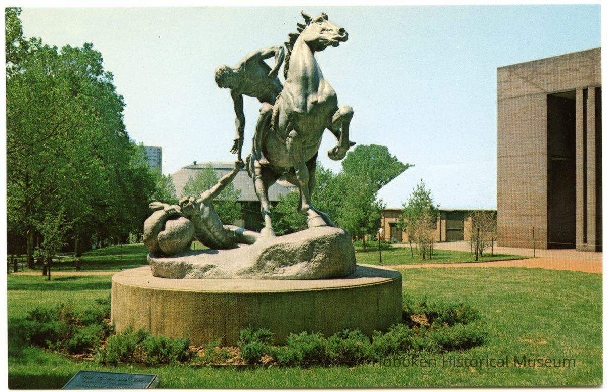 front - sculpture: The Torch Bearers