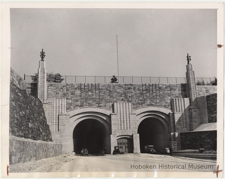 B+W photo of vehicles coming out of Lincoln Tunnel prior to official opening of north tube, Weehawken, Jan.31, 1945. picture number 1