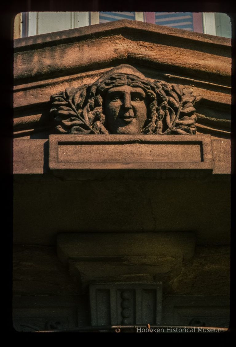 Color slide of detail view of pediment and capital on a building at an unidentified location picture number 1