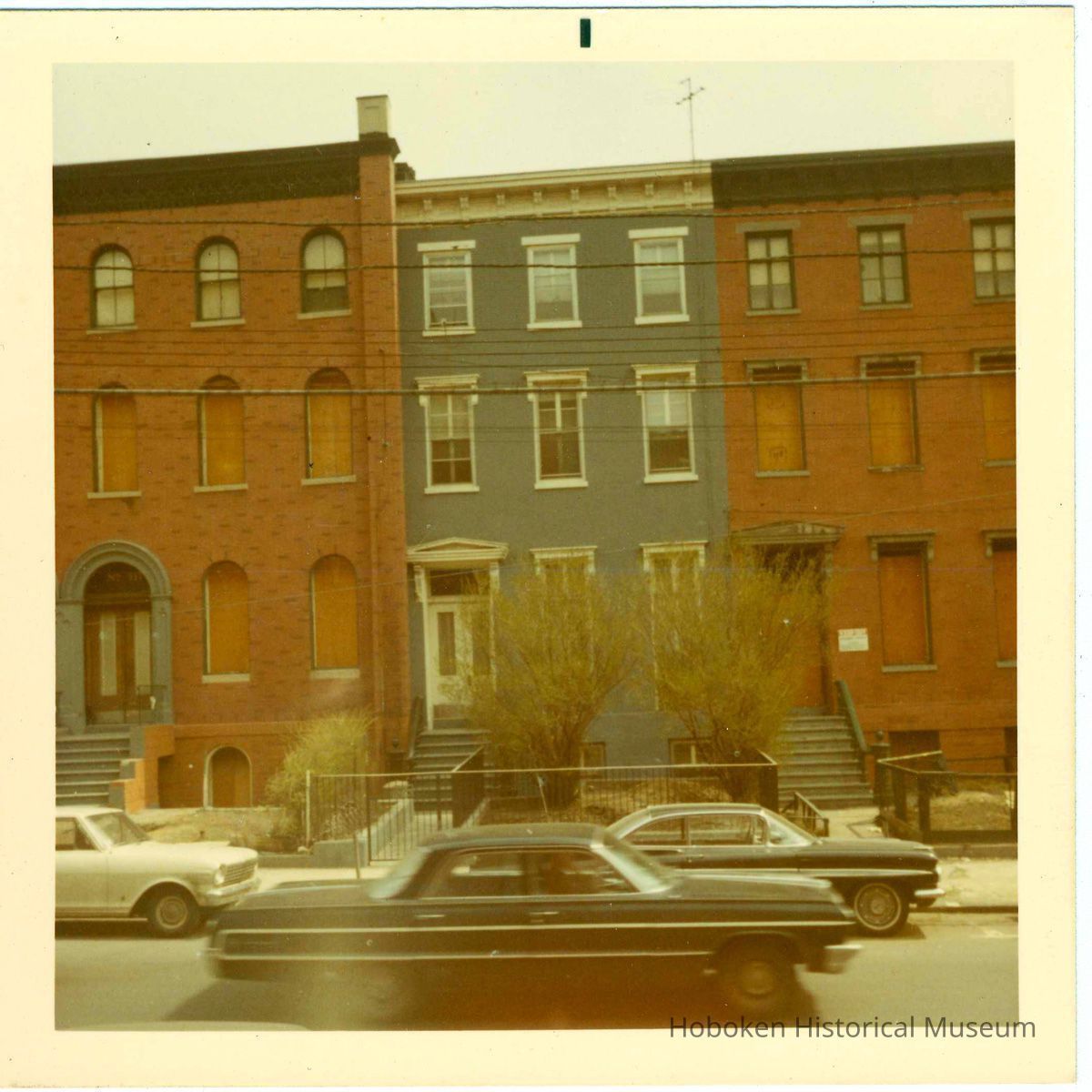 east side of Hudson St., somewhere between First and Fourth Sts