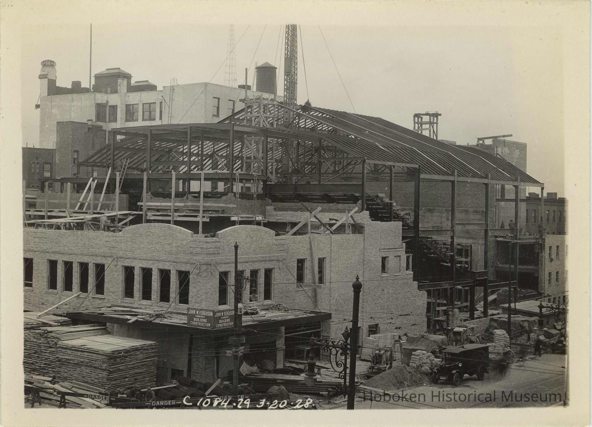Sepia-tone photo of steel frame erection & Newark St. frontage for the Fabian Theatre, Newark & Washington Sts., Hoboken, March 20, 1928. picture number 1