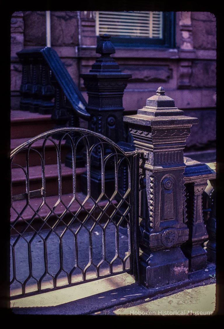 Color slide of detail view of stoop railings, balustrades, newels and gate at 1224 Garden between 12th & 13th picture number 1