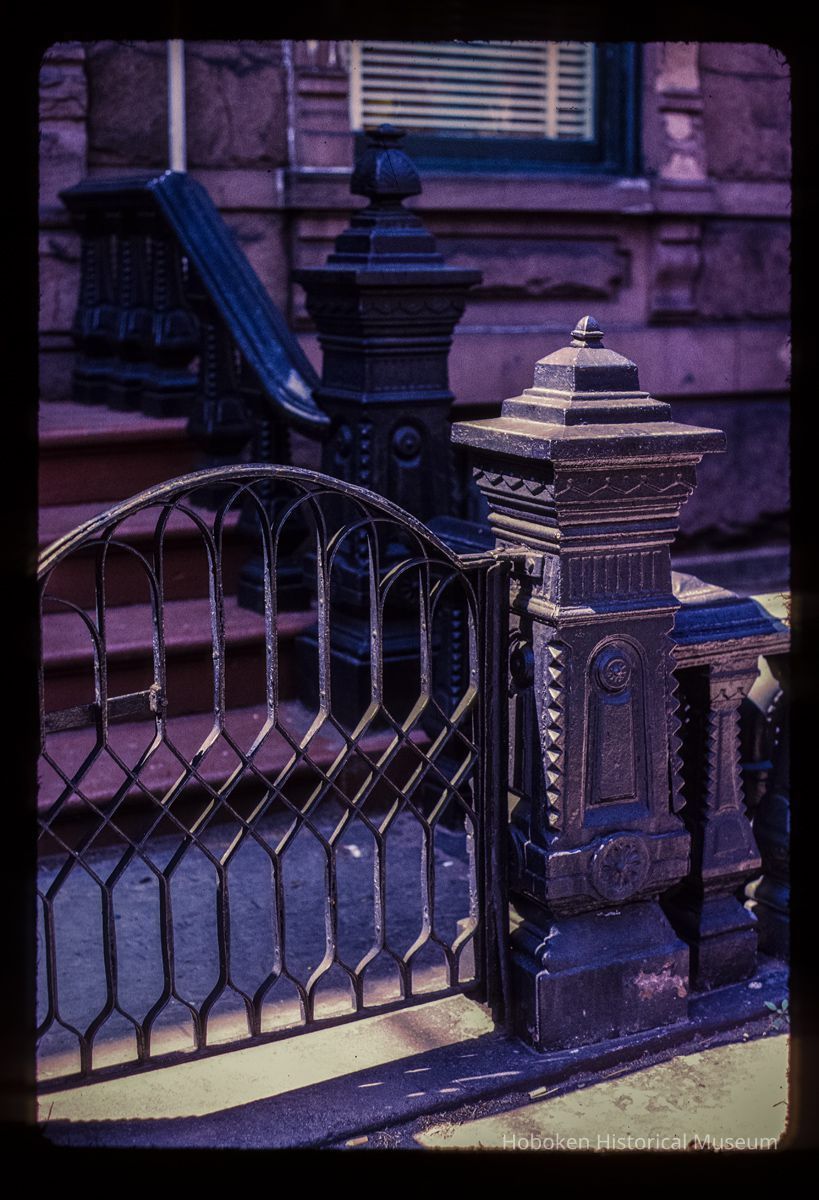 Color slide of detail view of stoop railings, balustrades, newels and gate at 1224 Garden between 12th & 13th picture number 1
