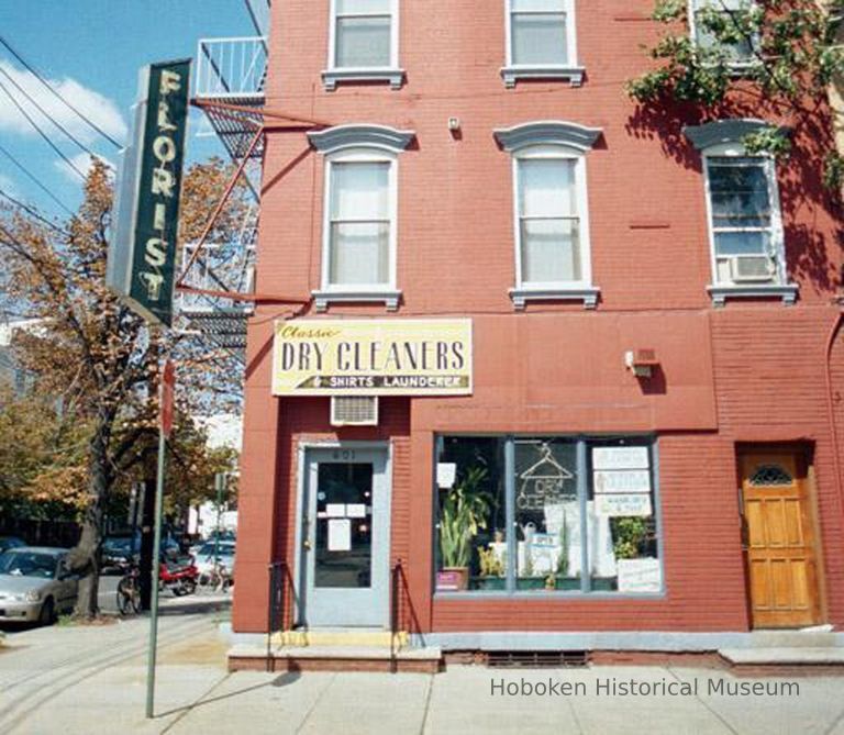 Color photo of sign and storefront for Classic Cleaners, 364 Sixth Street and a Florist sign, Hoboken, Sept., 1-5, 2001. picture number 1