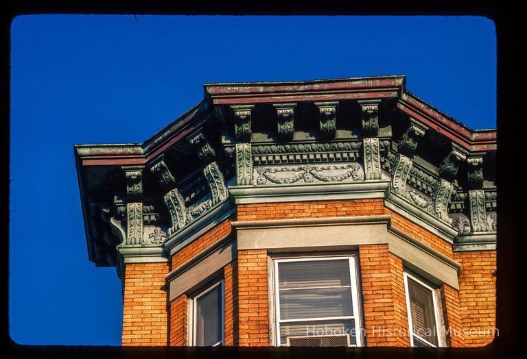 Color slide of close-up view of cornice, brackets, frieze and bay window on a building on Garden and 7th picture number 1